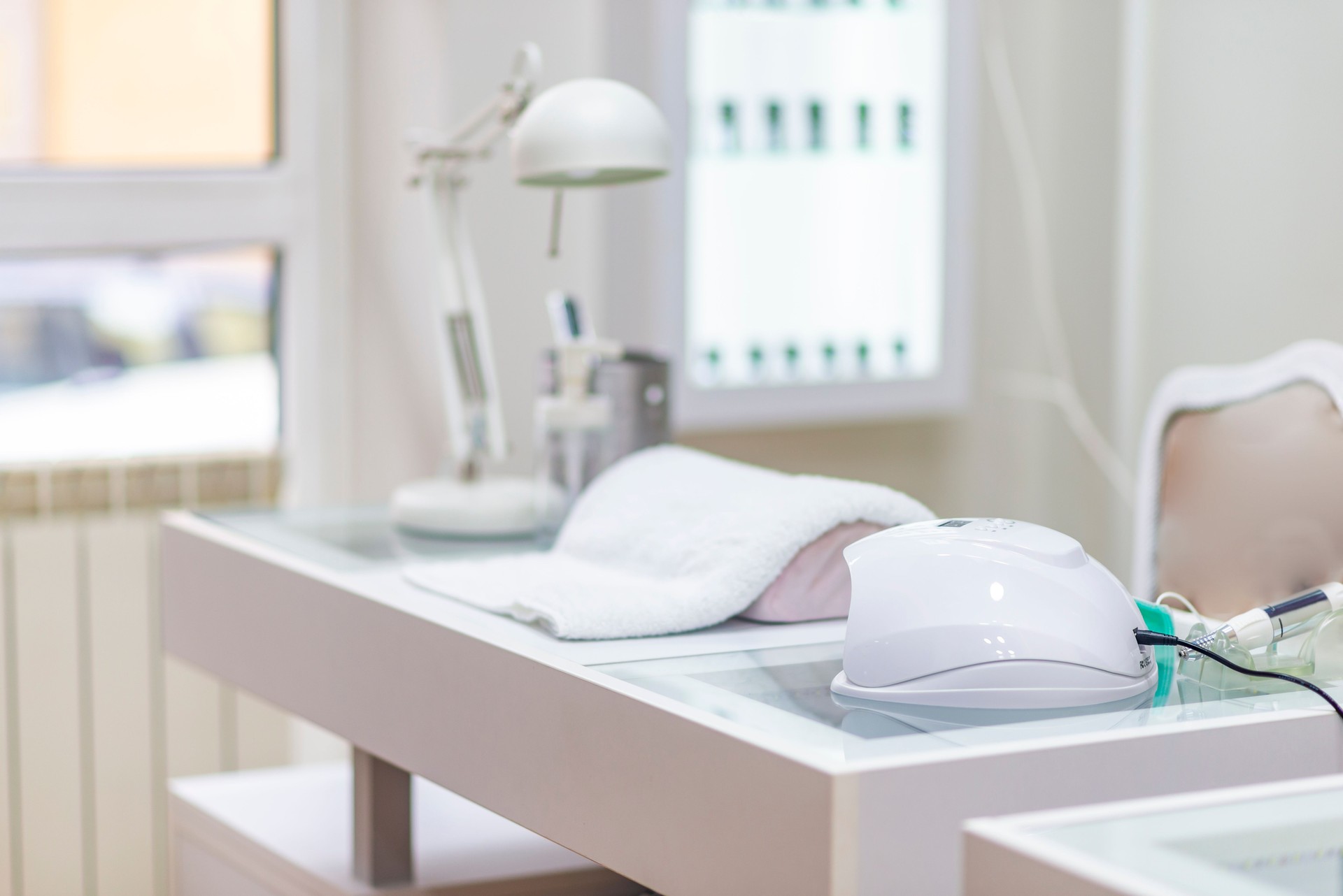Manicurist work place in modern beauty salon.